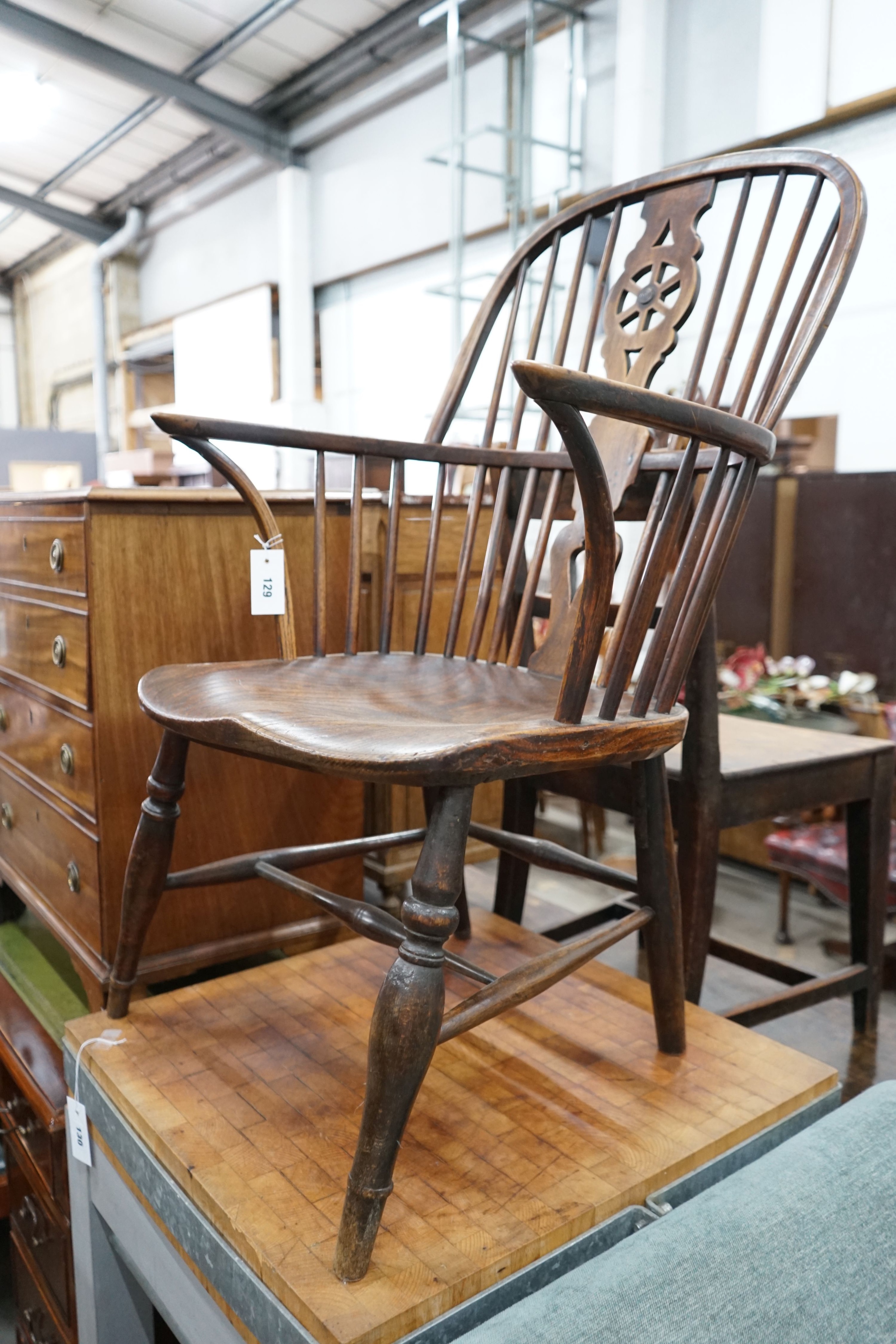 A 19th century ash, elm and beech Windsor wheelback armchair, width 57cm, depth 43cm, height 98cm